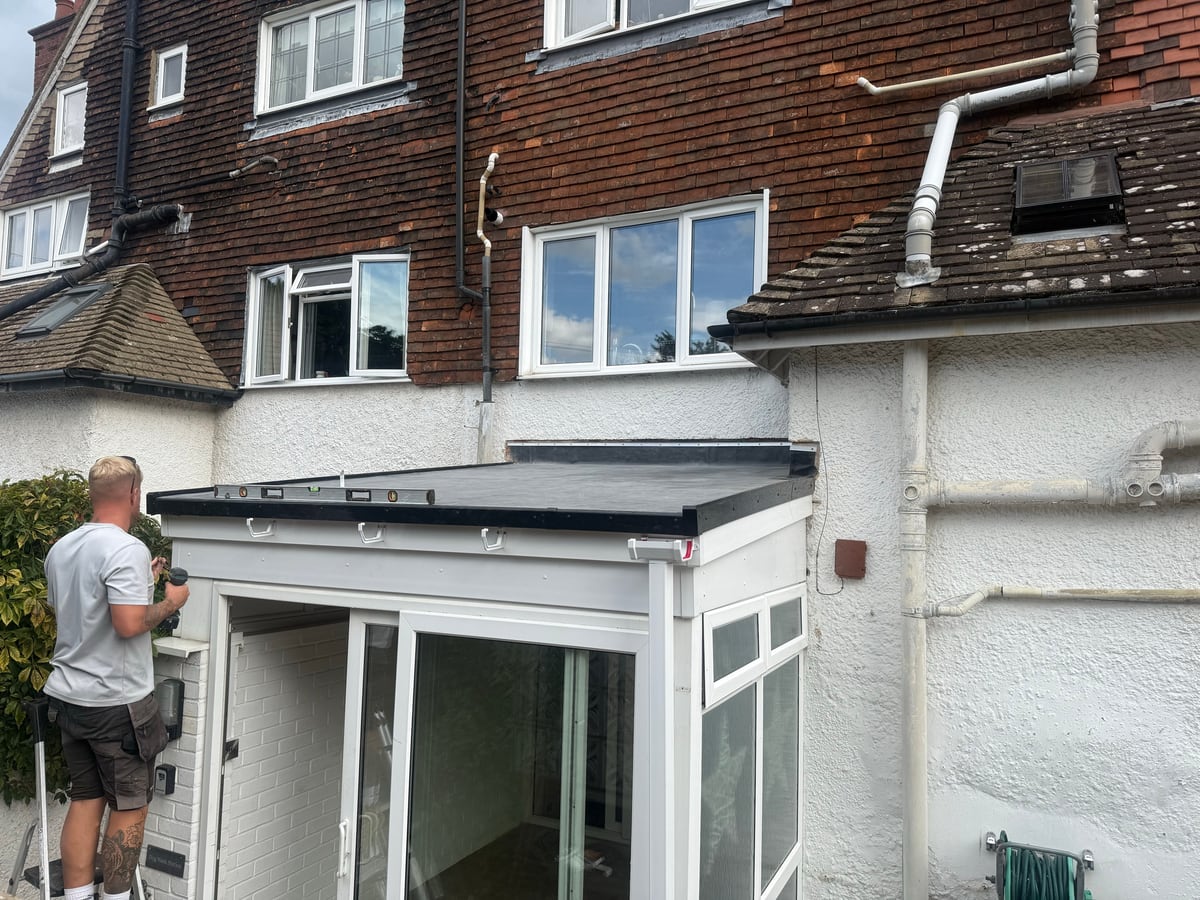 A small conservatory porch converted to a flat roof