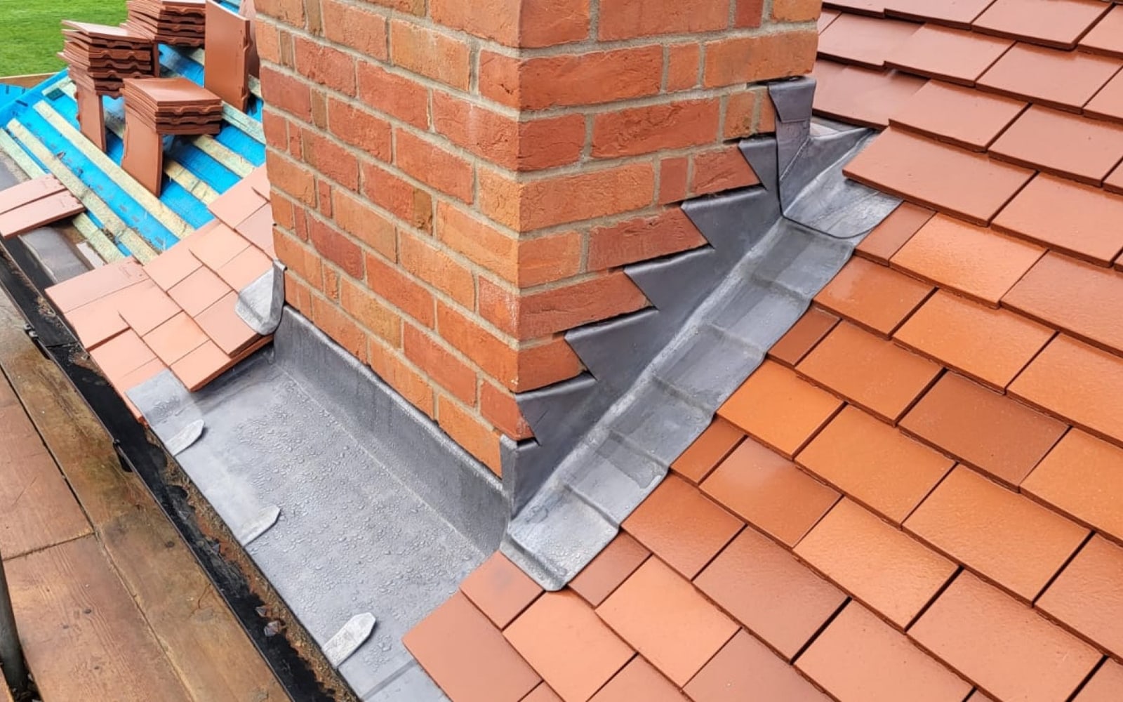 Lead flashing work on a chimney repair