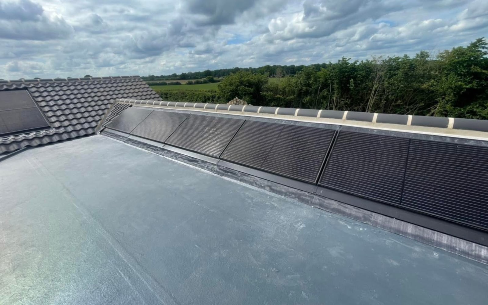 Solar panels fitted to a concrete tile roof